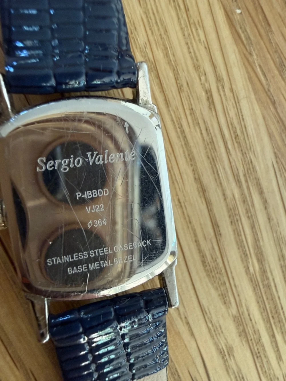 Vintage Sergio Valente Watch, Time & Date. New Battery & Blue Leather Band